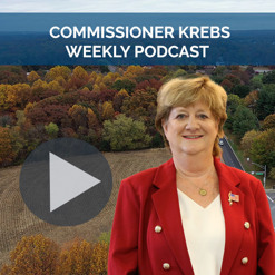 Commissioner Susan W. Krebs Photo with scene of Rt 32